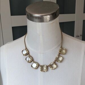 Elegant Gold and White Necklace with Faceted Crystals